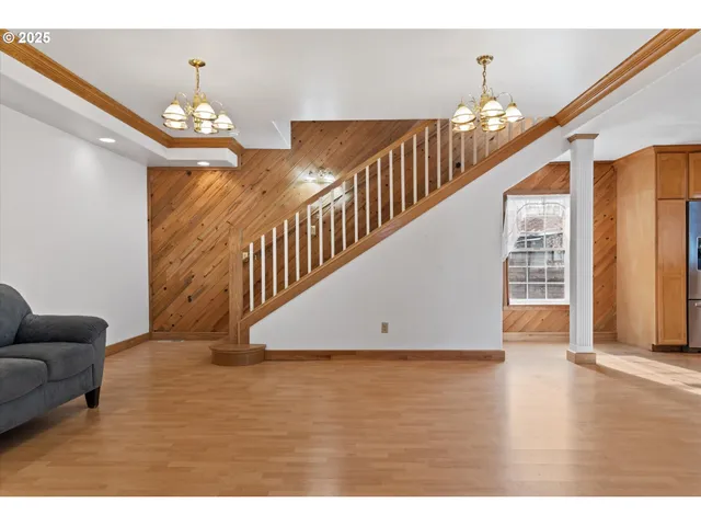 a view of livingroom with furniture and stairs
