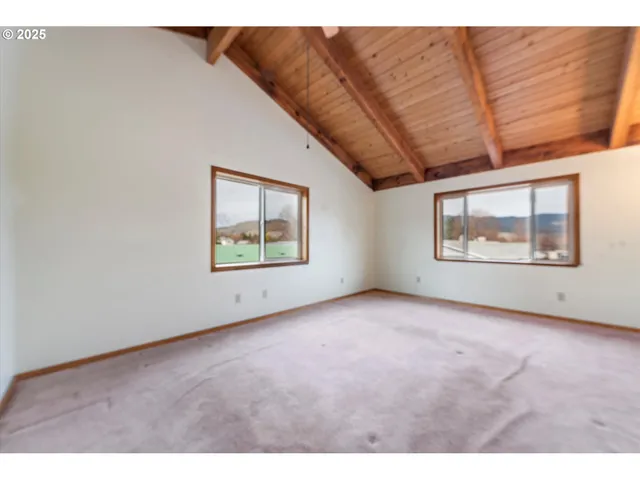 a bathroom with a sink mirror vanity and toilet