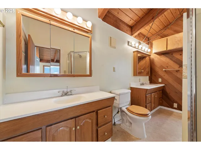 a view of a bathroom with a glass door