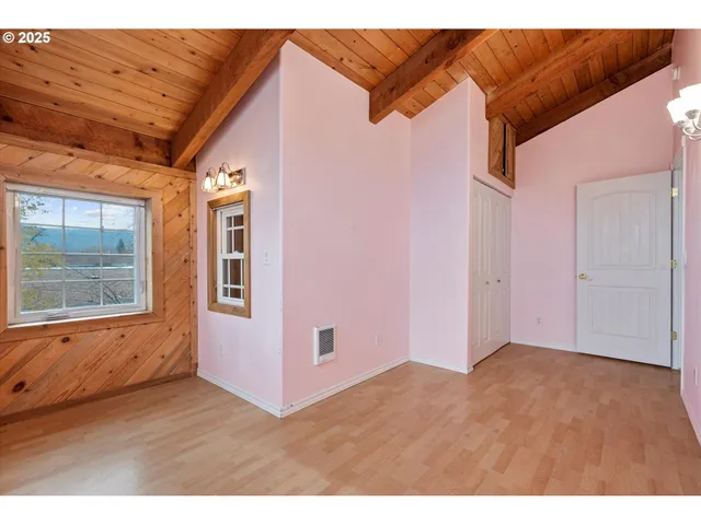 a view of a house with a yard and garage