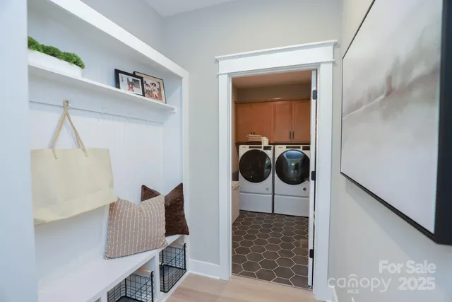 a view of a livingroom with furniture and windows