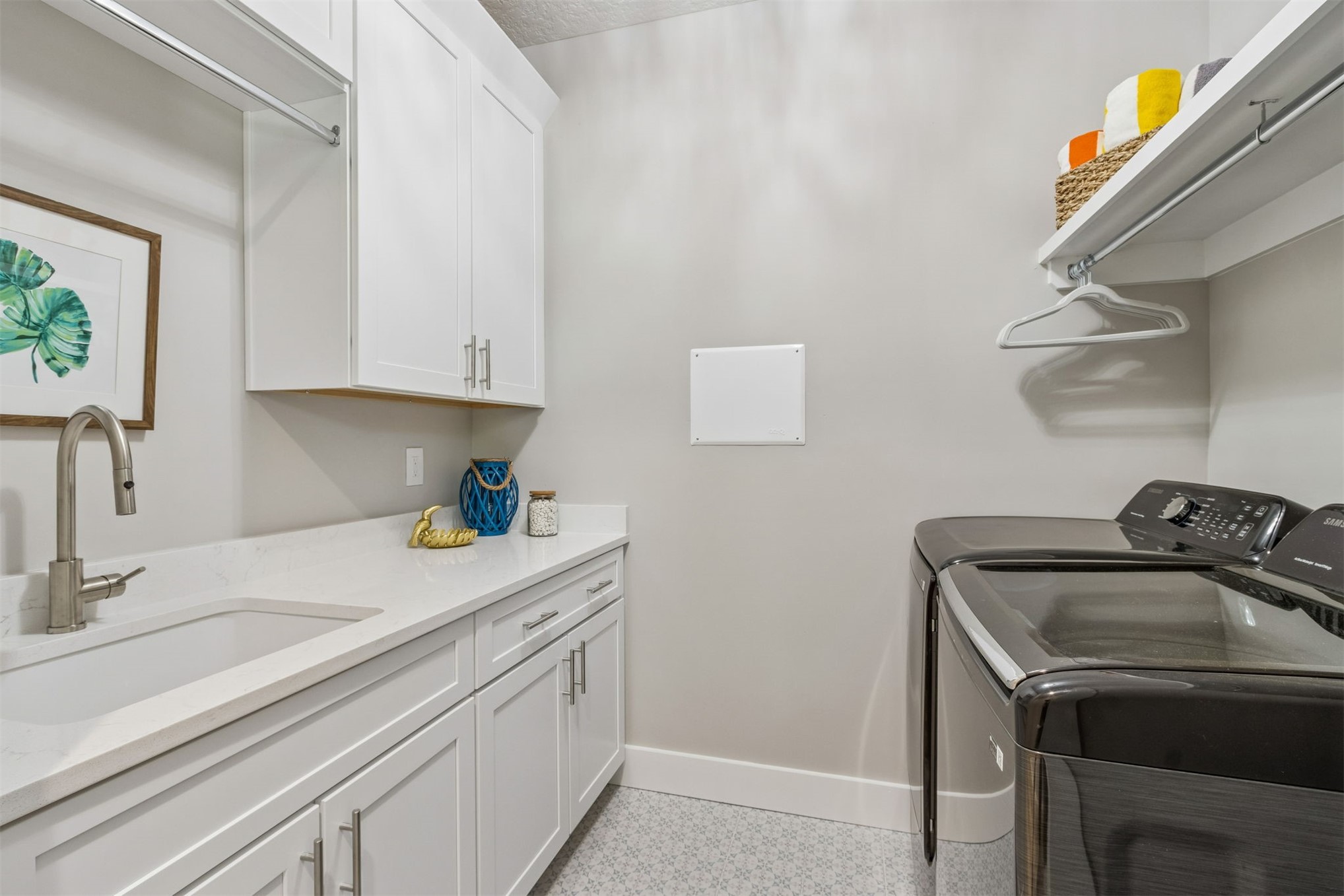 96050 Captains Pointe Road Yulee, FL 32097 - Photo 17 of 36 a view of a kitchen with sink and washing machine