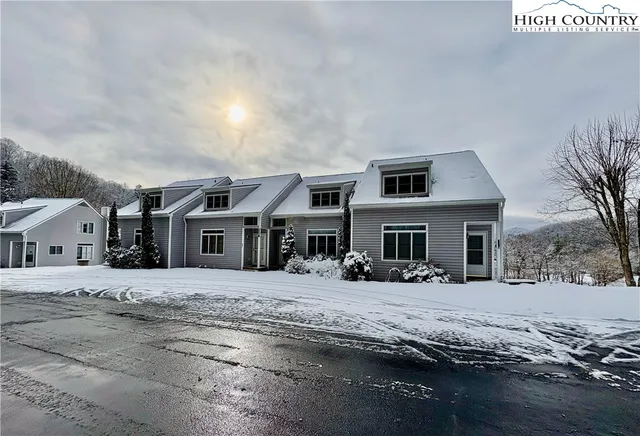 a front view of a house with yard