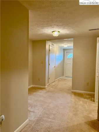 an empty room with a natural light