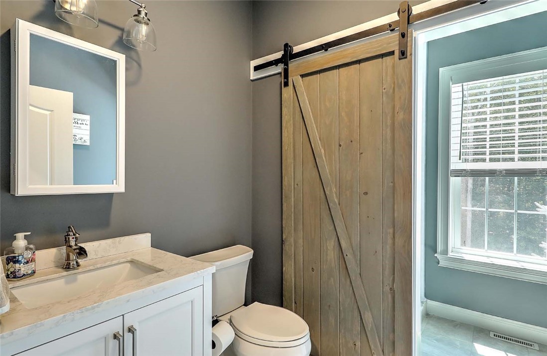 1 West Farm Road Smithfield, RI 02917 - Photo 20 of 50 First floor full bathroom with sliding barn door
