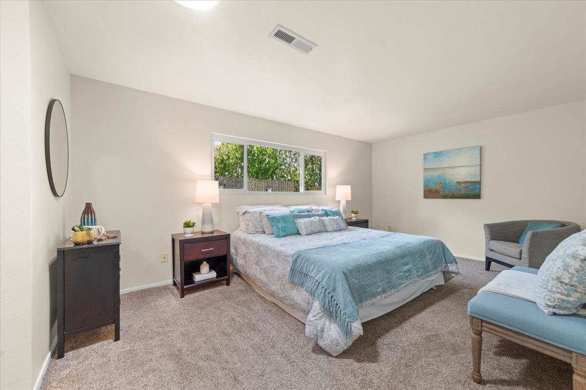 1300 Amesti Road Watsonville, CA 95076 - Photo 15 of 34 a bedroom with a bed and a couch