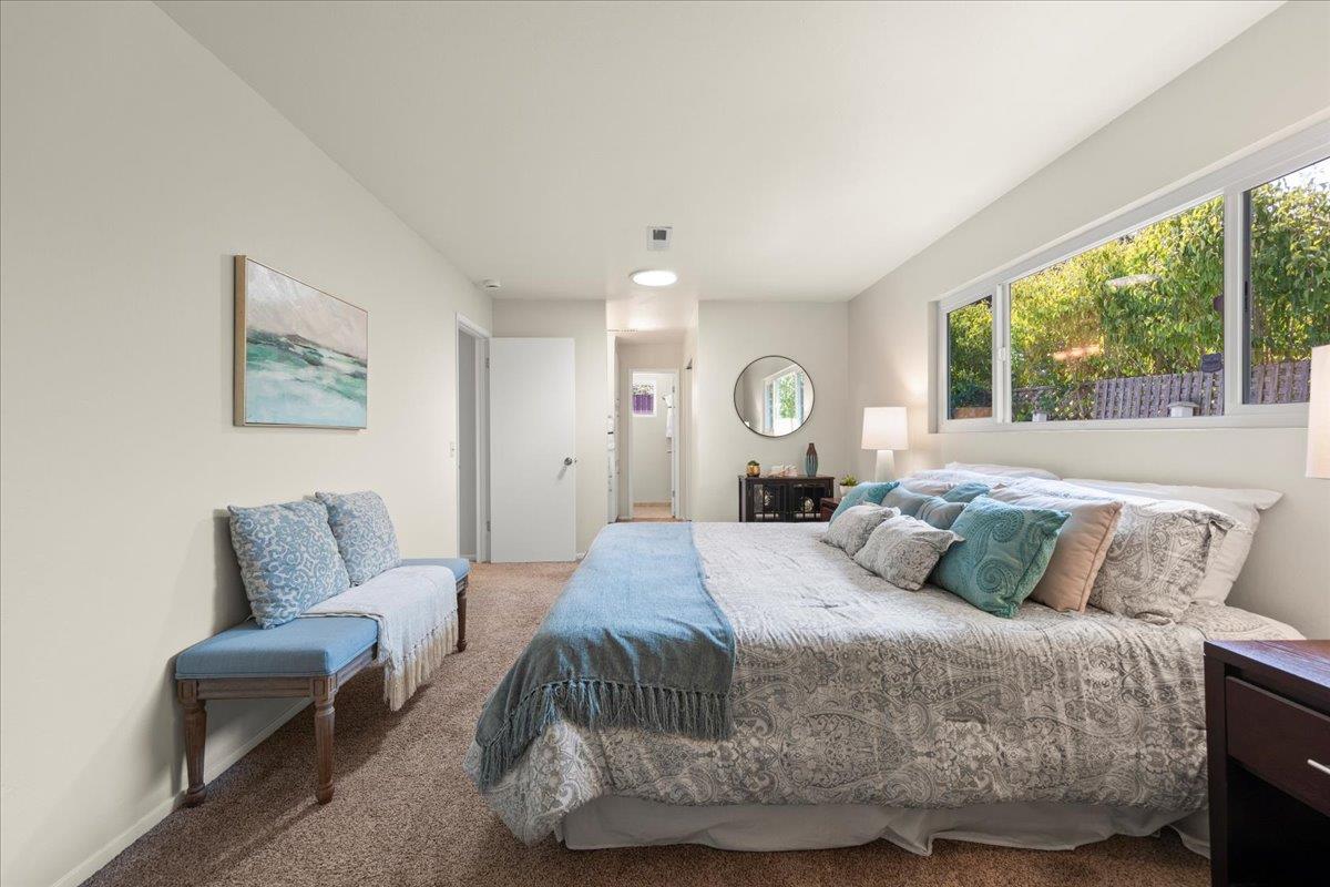 1300 Amesti Road Watsonville, CA 95076 - Photo 16 of 34 a bedroom with a bed and a large window