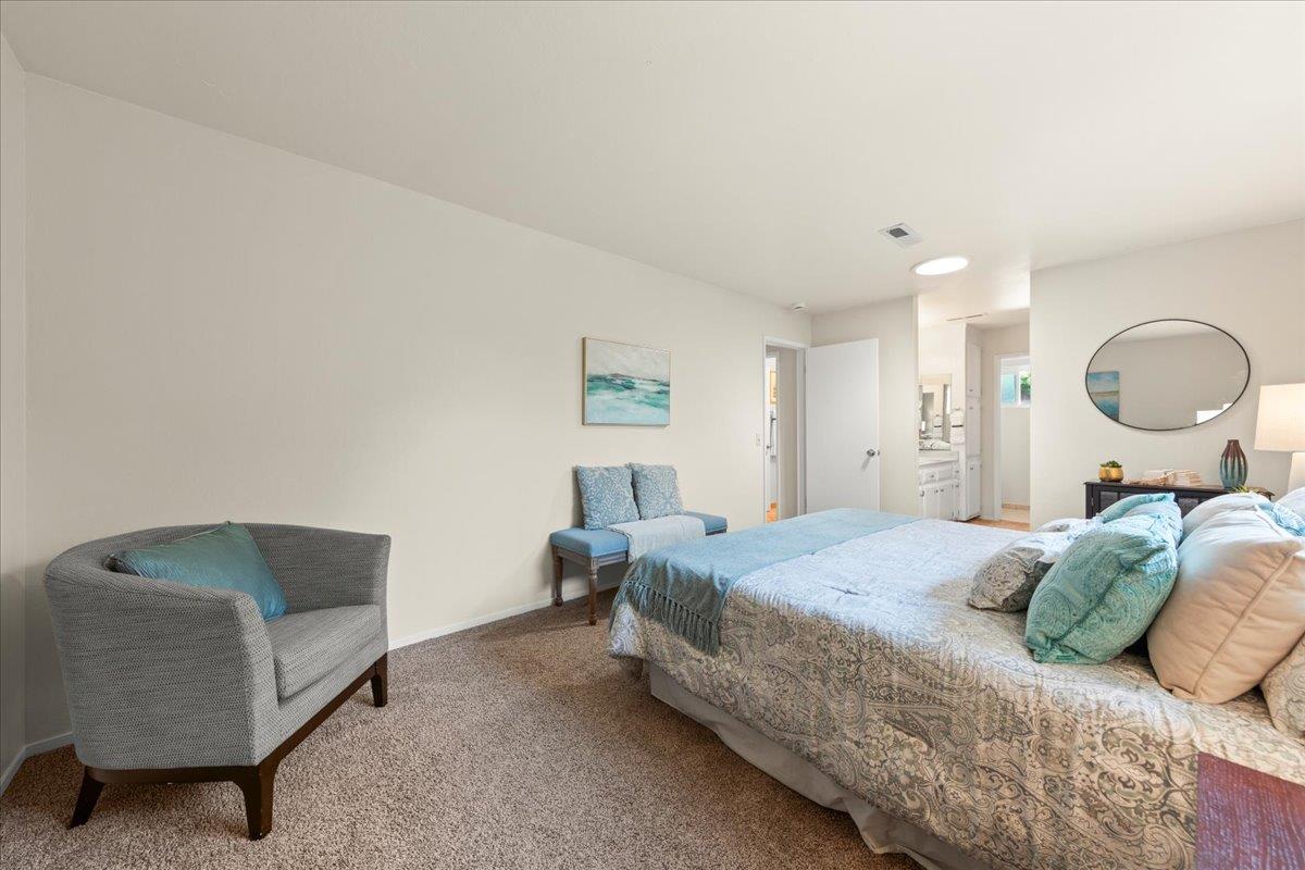 1300 Amesti Road Watsonville, CA 95076 - Photo 17 of 34 a bedroom with a bed and chair