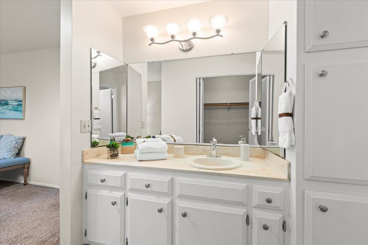 1300 Amesti Road Watsonville, CA 95076 - Photo 19 of 34 a bathroom with a sink vanity and mirror