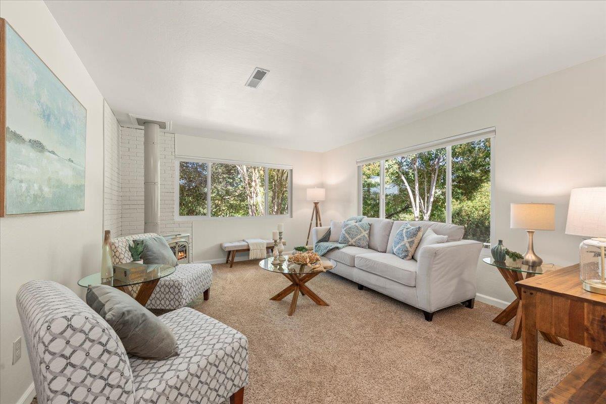 1300 Amesti Road Watsonville, CA 95076 - Photo 2 of 34 a living room with furniture and a large window