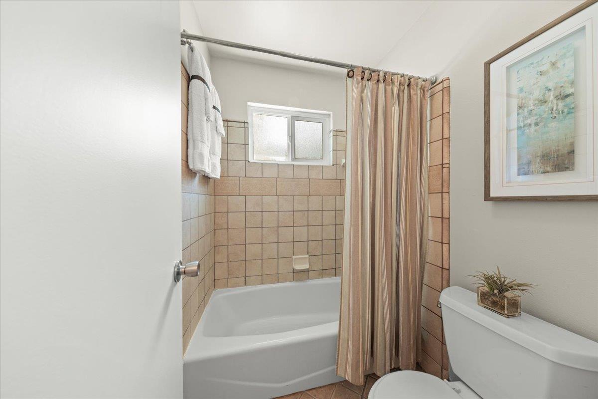 1300 Amesti Road Watsonville, CA 95076 - Photo 27 of 34 a bathroom with a toilet and a bathtub