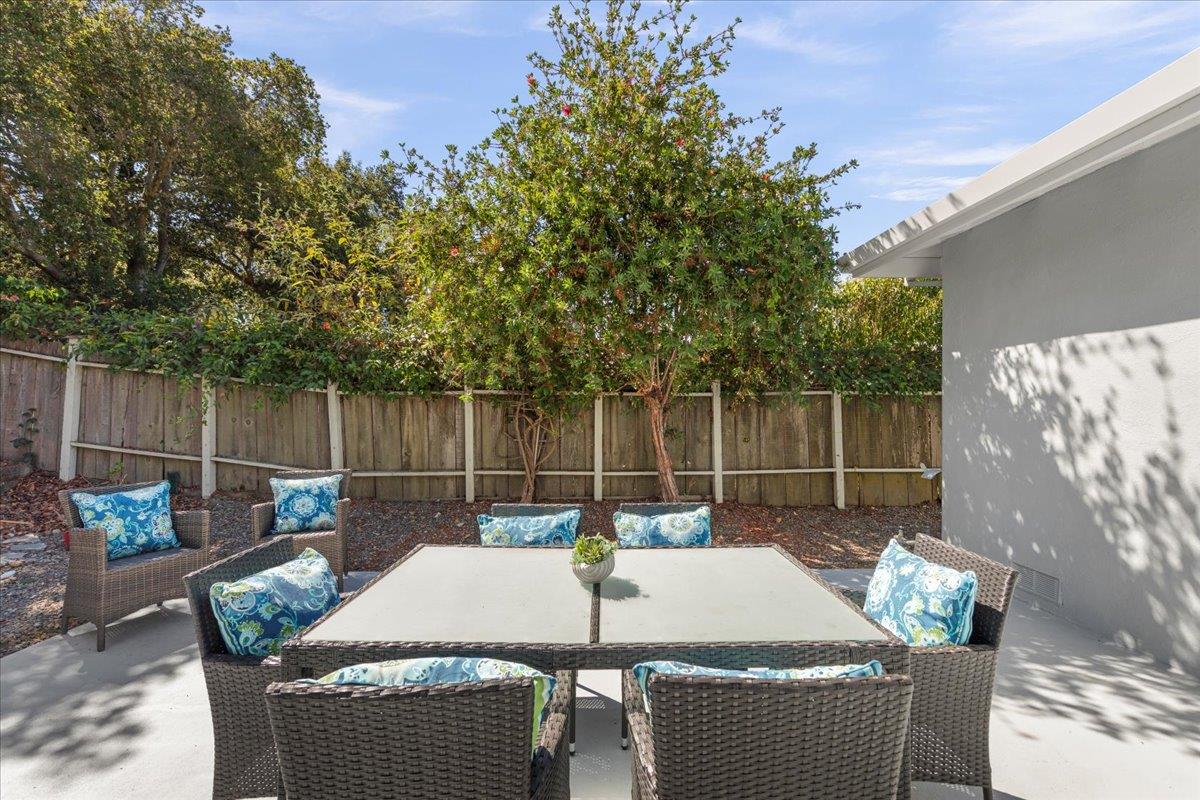1300 Amesti Road Watsonville, CA 95076 - Photo 28 of 34 a backyard of a house with table and chairs