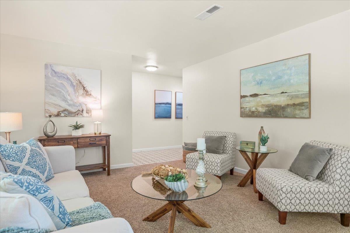 1300 Amesti Road Watsonville, CA 95076 - Photo 4 of 34 a living room with furniture and a wooden floor