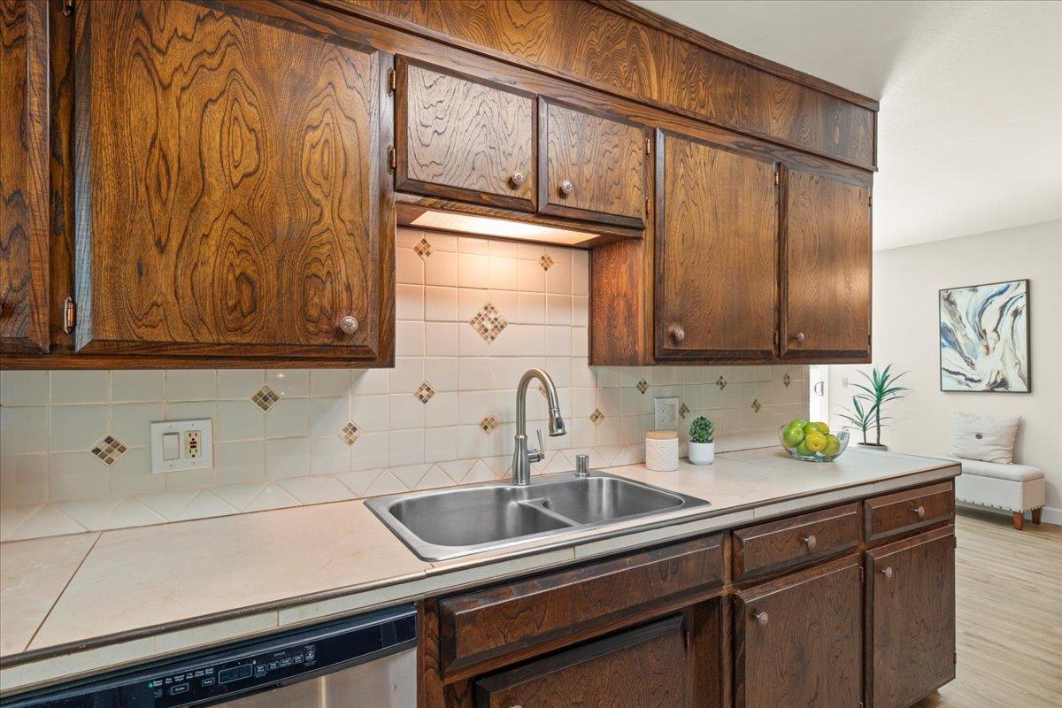 1300 Amesti Road Watsonville, CA 95076 - Photo 8 of 34 a kitchen with a sink and cabinets