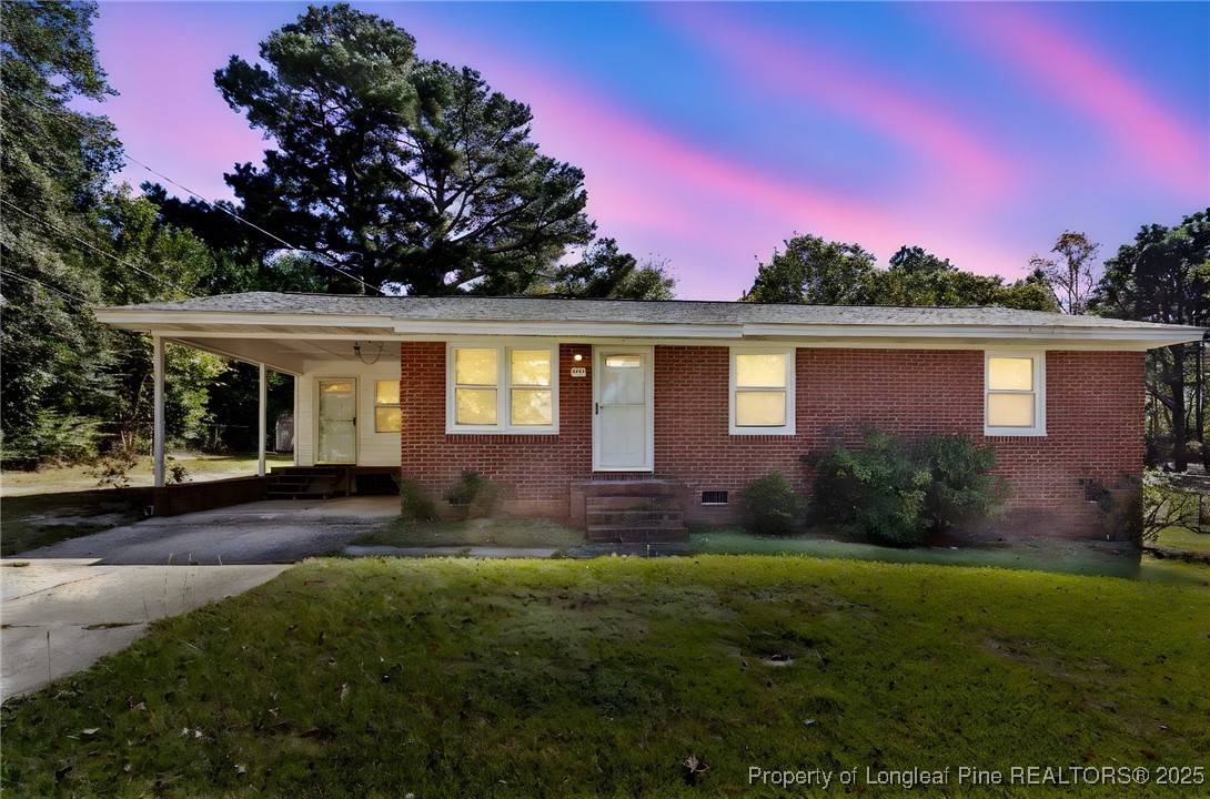 front view of a house with yard