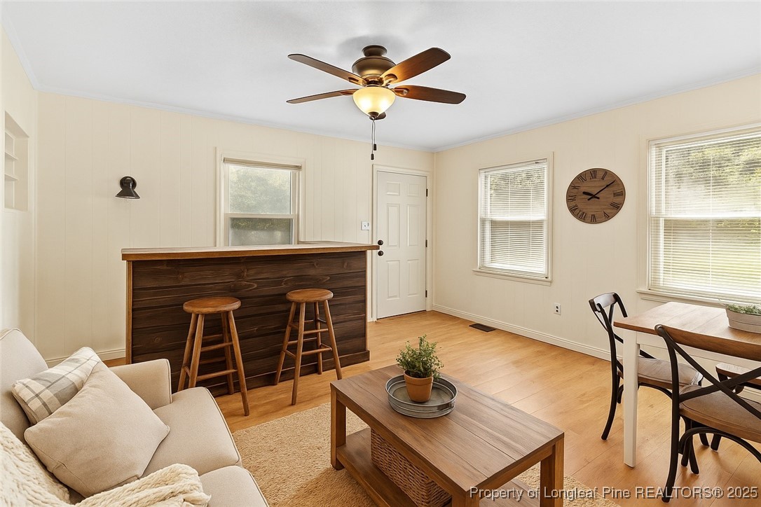 1512 Crescent Drive Spring Lake, NC 28390 - Photo 16 of 36 a living room with furniture and a fireplace