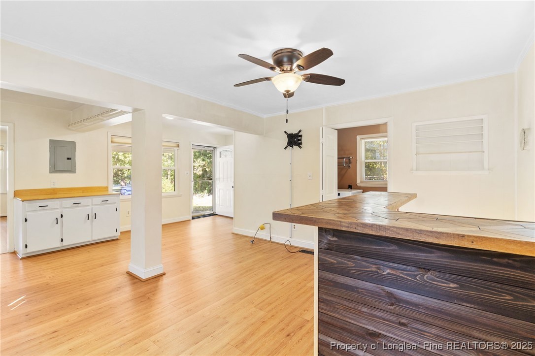 1512 Crescent Drive Spring Lake, NC 28390 - Photo 18 of 36 a view of an empty room with window and wooden floor