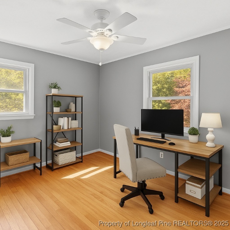 1512 Crescent Drive Spring Lake, NC 28390 - Photo 25 of 36 a view of a workspace with furniture and a window