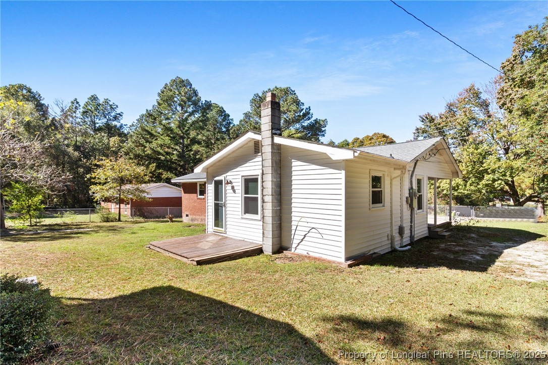 1512 Crescent Drive Spring Lake, NC 28390 - Photo 34 of 36 a front view of a house with a yard