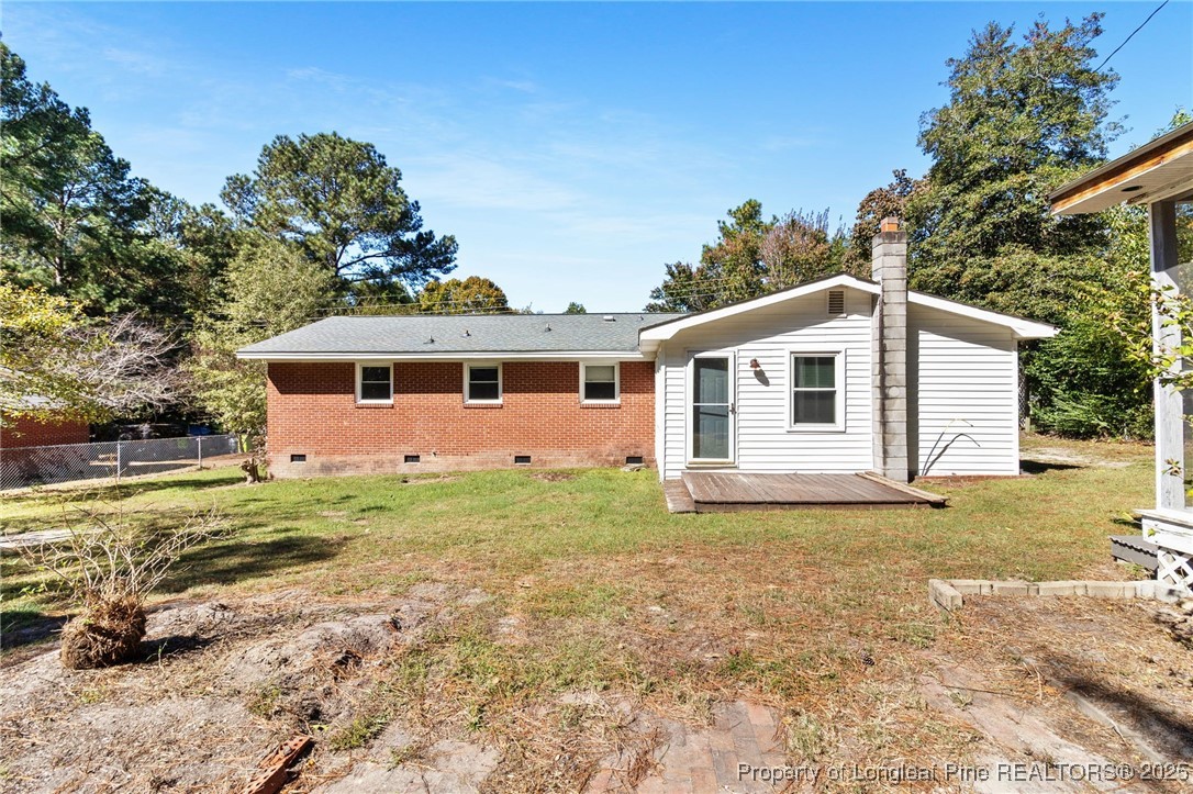 1512 Crescent Drive Spring Lake, NC 28390 - Photo 35 of 36 a view of a house with a yard