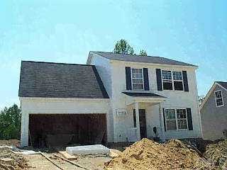 4021 Apperson Drive Raleigh, NC 27610 - Photo 1 of 1 a front view of a house with a yard