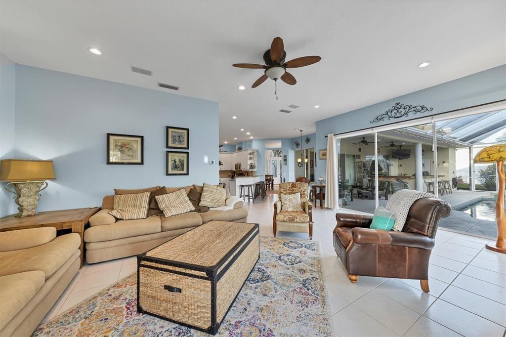 9910 Laurel Valley Ave Circle Bradenton, FL 34202 - Photo 18 of 37 a living room with furniture and a large window