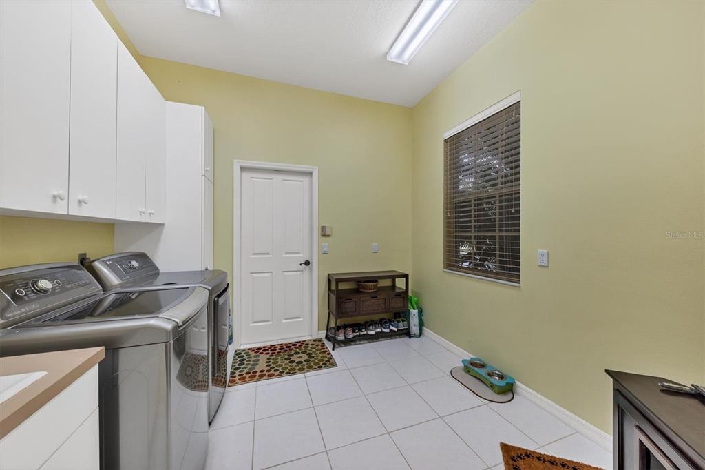 9910 Laurel Valley Ave Circle Bradenton, FL 34202 - Photo 25 of 37 a room with storage and utility