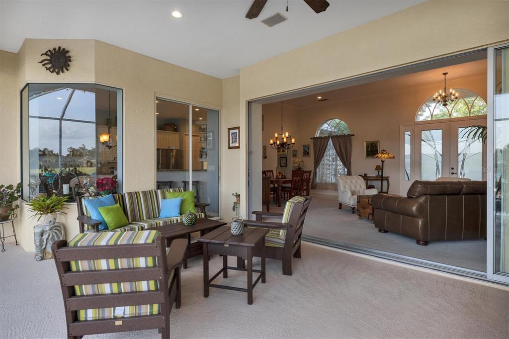 9910 Laurel Valley Ave Circle Bradenton, FL 34202 - Photo 29 of 37 a living room with furniture and a large window