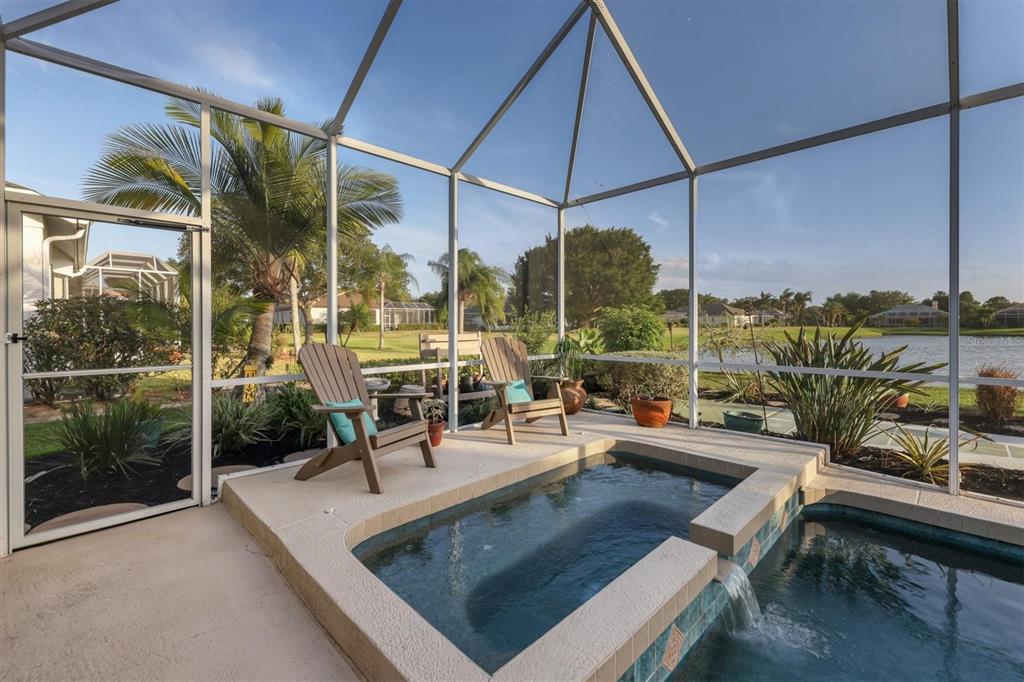 9910 Laurel Valley Ave Circle Bradenton, FL 34202 - Photo 33 of 37 a view of a swimming pool with a patio