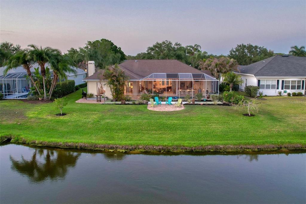 9910 Laurel Valley Ave Circle Bradenton, FL 34202 - Photo 35 of 37 a view of a house with a yard and a fountain