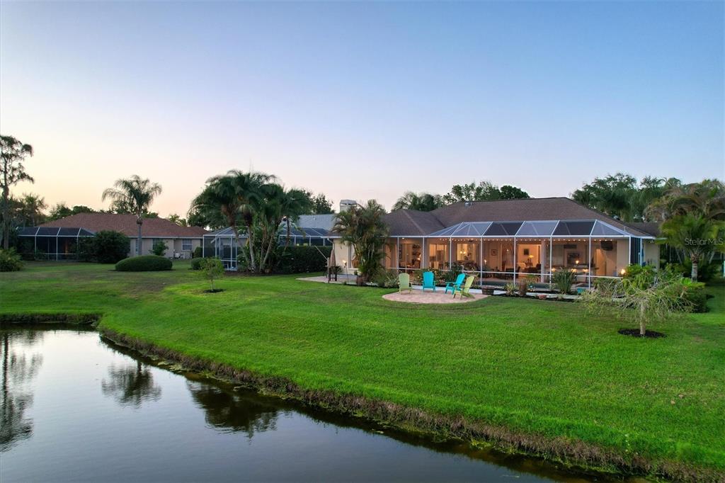 9910 Laurel Valley Ave Circle Bradenton, FL 34202 - Photo 36 of 37 a view of a house with a yard porch and sitting area