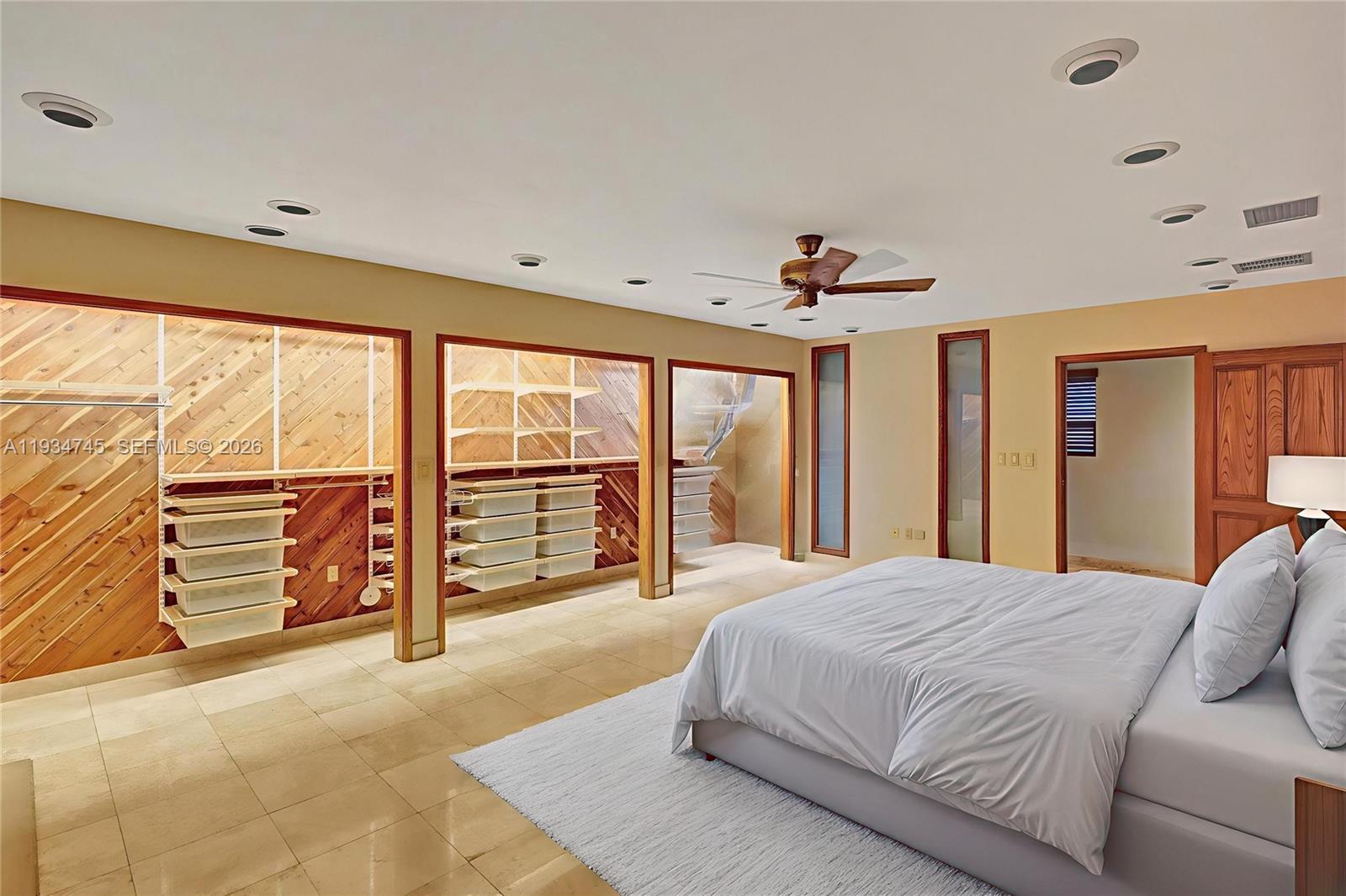 366 West 12th Street Hialeah, FL 33010 - Photo 5 of 99 a spacious bedroom with a large bed and a large window