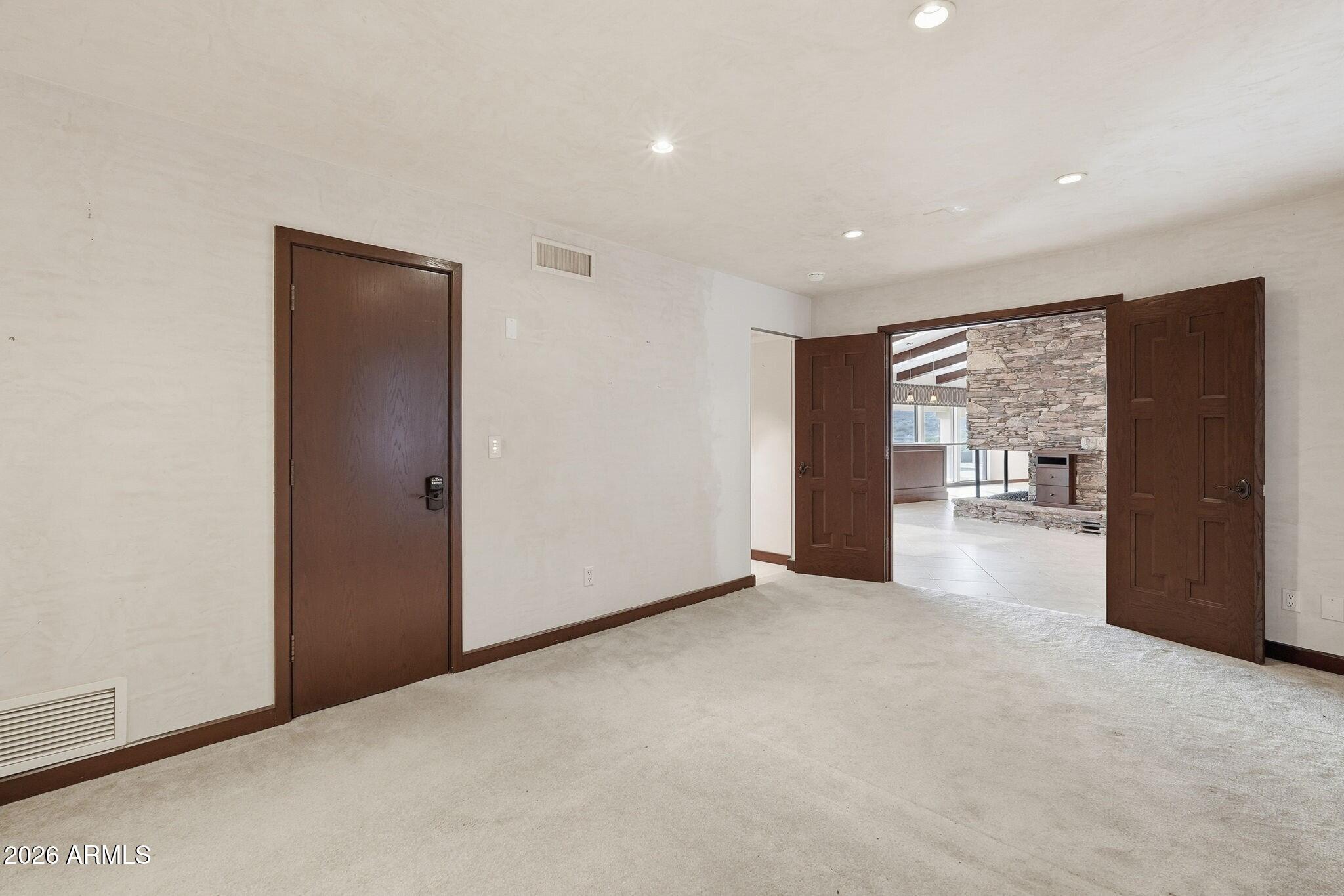 4021 East Lamar Road Paradise Valley, AZ 85253 - Photo 23 of 48 a view of empty room with wooden floor