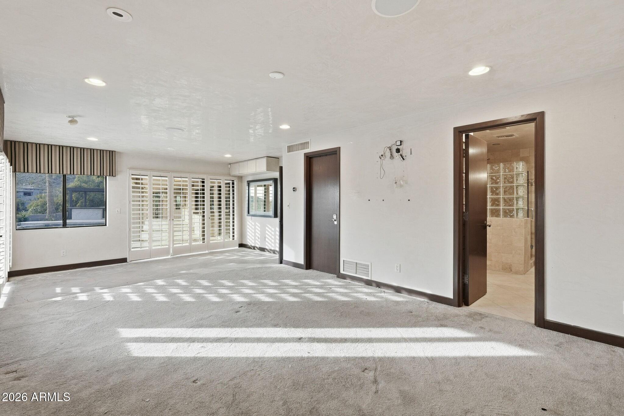 4021 East Lamar Road Paradise Valley, AZ 85253 - Photo 25 of 48 a view of a big room with windows and cabinet