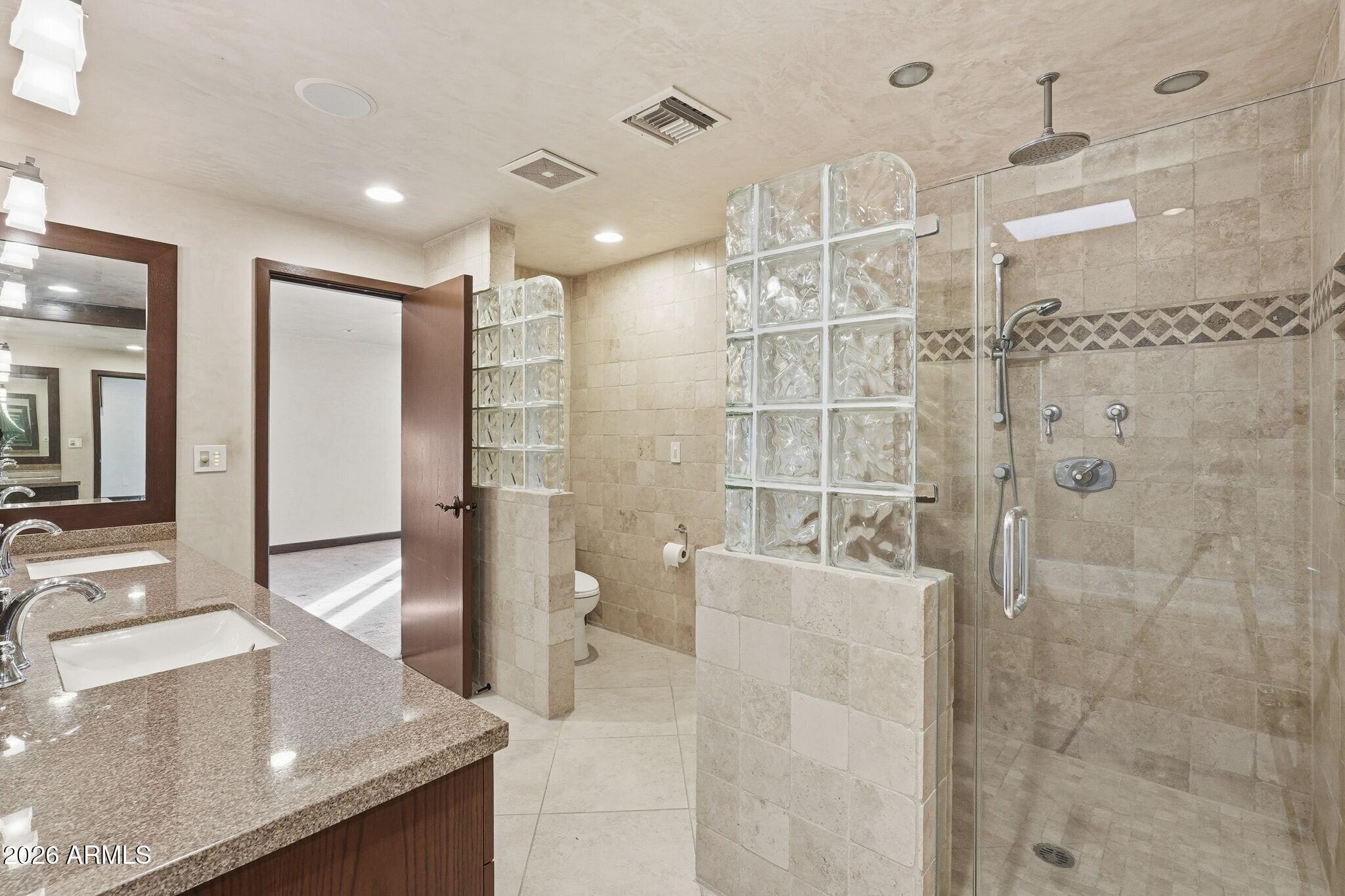 4021 East Lamar Road Paradise Valley, AZ 85253 - Photo 28 of 48 a bathroom with a sink and mirror