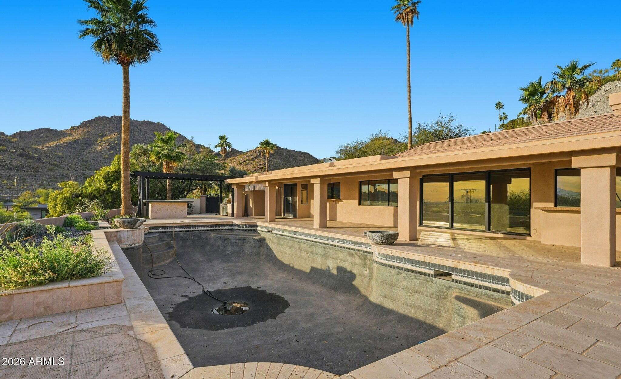4021 East Lamar Road Paradise Valley, AZ 85253 - Photo 33 of 48 a front view of a house with porch