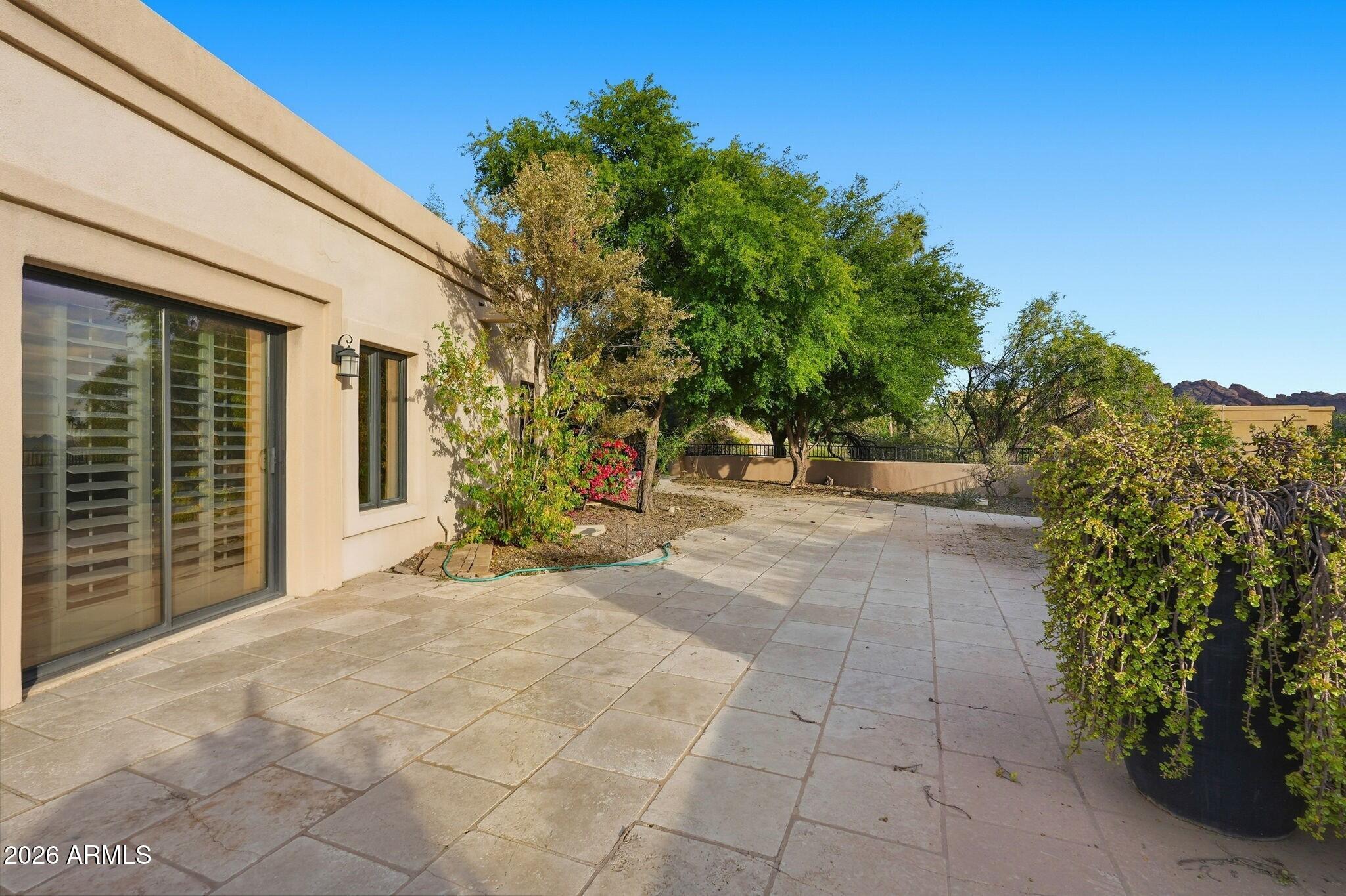 4021 East Lamar Road Paradise Valley, AZ 85253 - Photo 35 of 48 a view of a house with backyard and trees