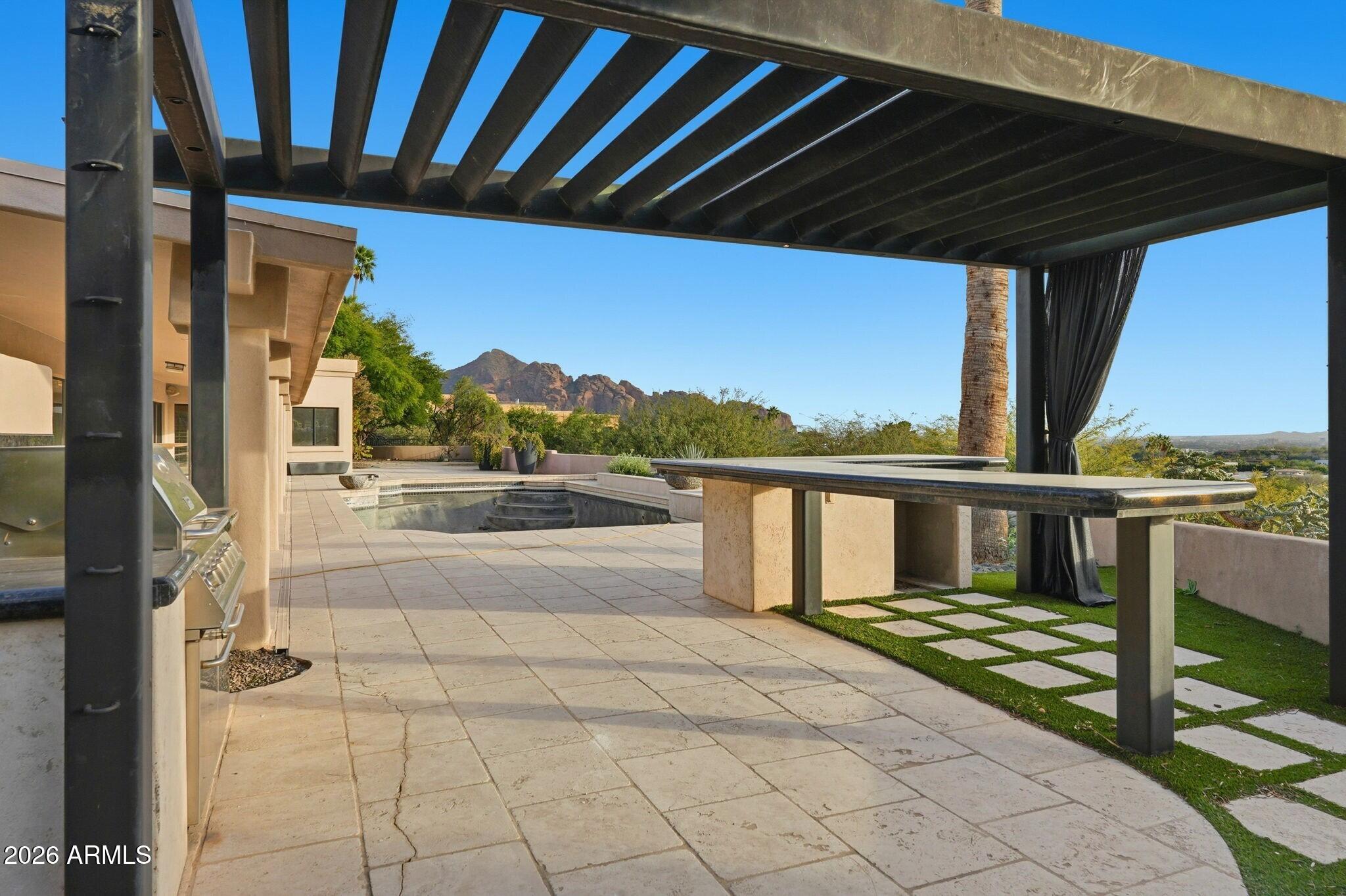 4021 East Lamar Road Paradise Valley, AZ 85253 - Photo 36 of 48 a view of balcony with wooden floor