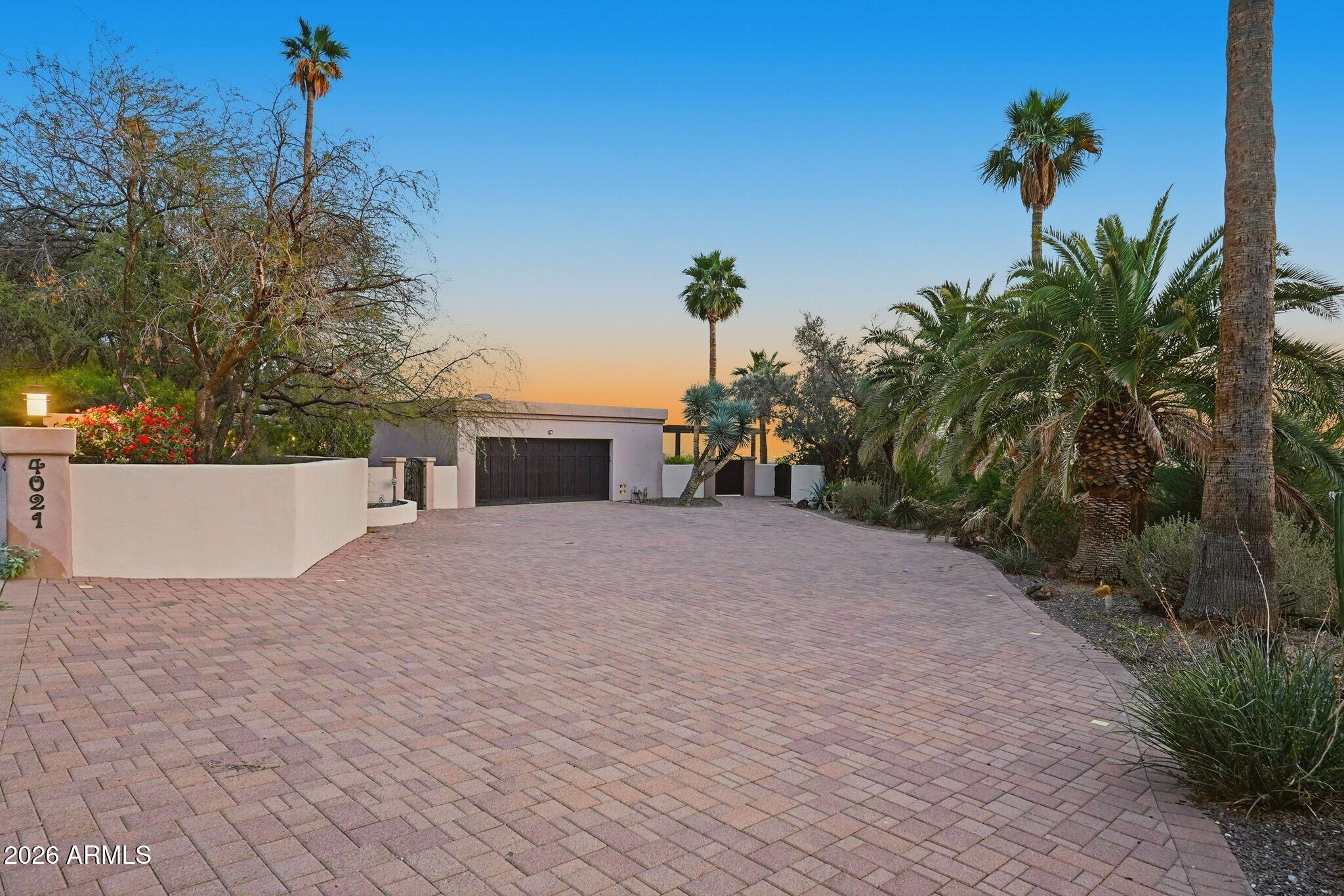 4021 East Lamar Road Paradise Valley, AZ 85253 - Photo 38 of 48 a house view with a garden space