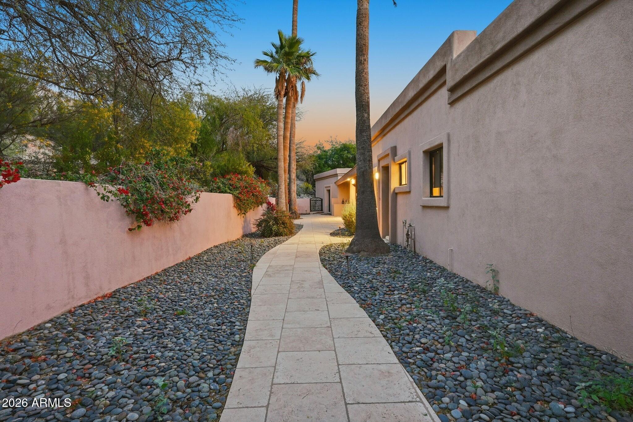 4021 East Lamar Road Paradise Valley, AZ 85253 - Photo 40 of 48 a house with trees in front of it