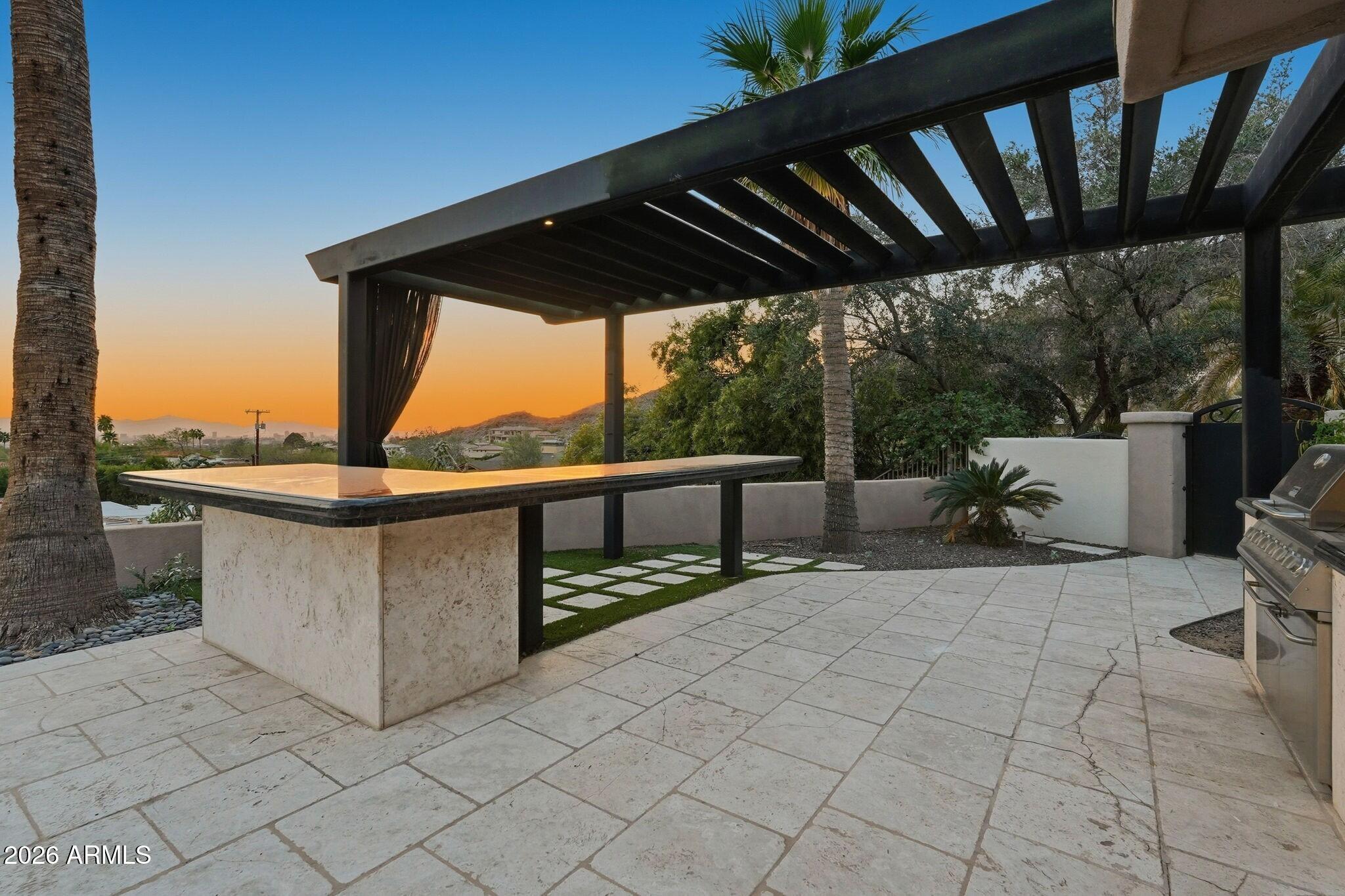 4021 East Lamar Road Paradise Valley, AZ 85253 - Photo 42 of 48 a view of swimming pool with a patio