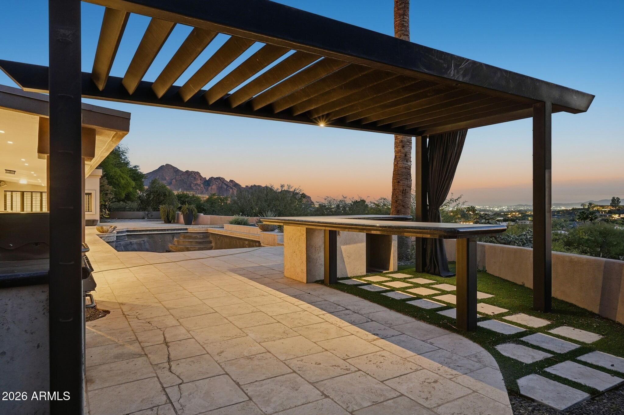 4021 East Lamar Road Paradise Valley, AZ 85253 - Photo 45 of 48 a view of balcony with wooden floor and barbeque grill