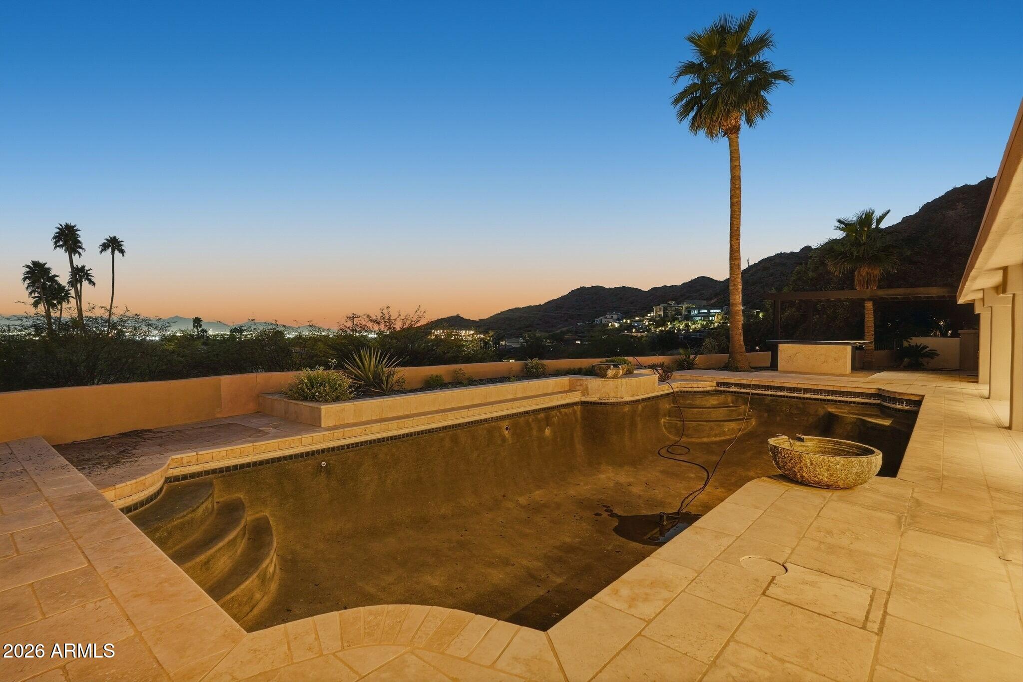 4021 East Lamar Road Paradise Valley, AZ 85253 - Photo 48 of 48 a view of swimming pool with outdoor seating