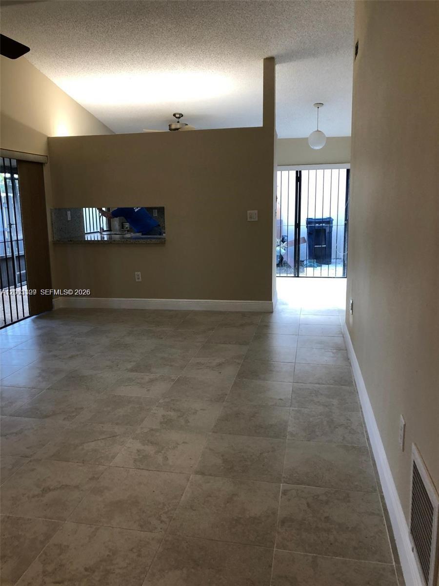 9164 Southwest 132nd Lane Miami, FL 33176 - Photo 8 of 15 an empty room with windows
