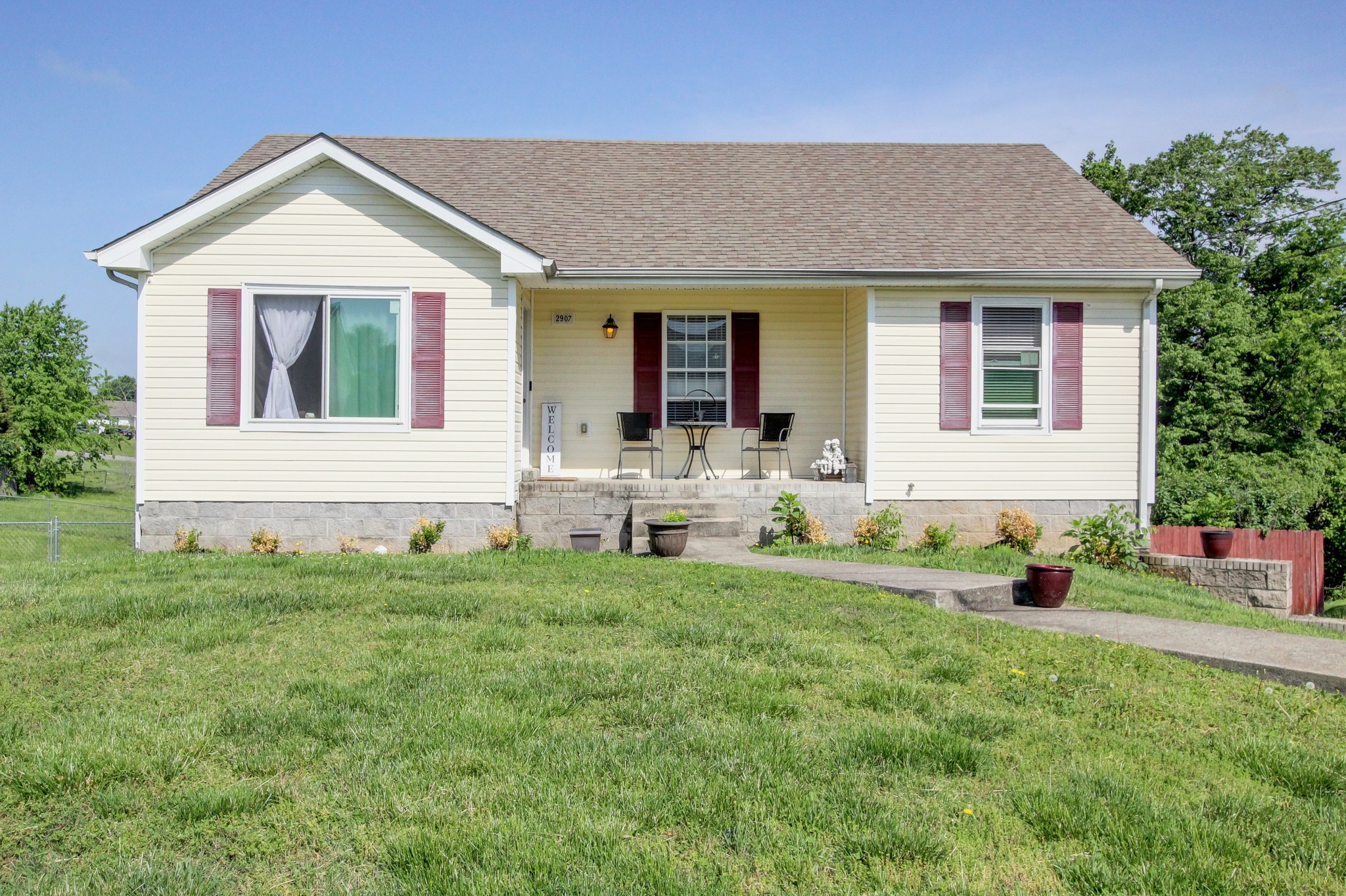 2907 Rome Lane Clarksville, TN 37040 - Photo 1 of 20 a front view of house with yard and outdoor seating
