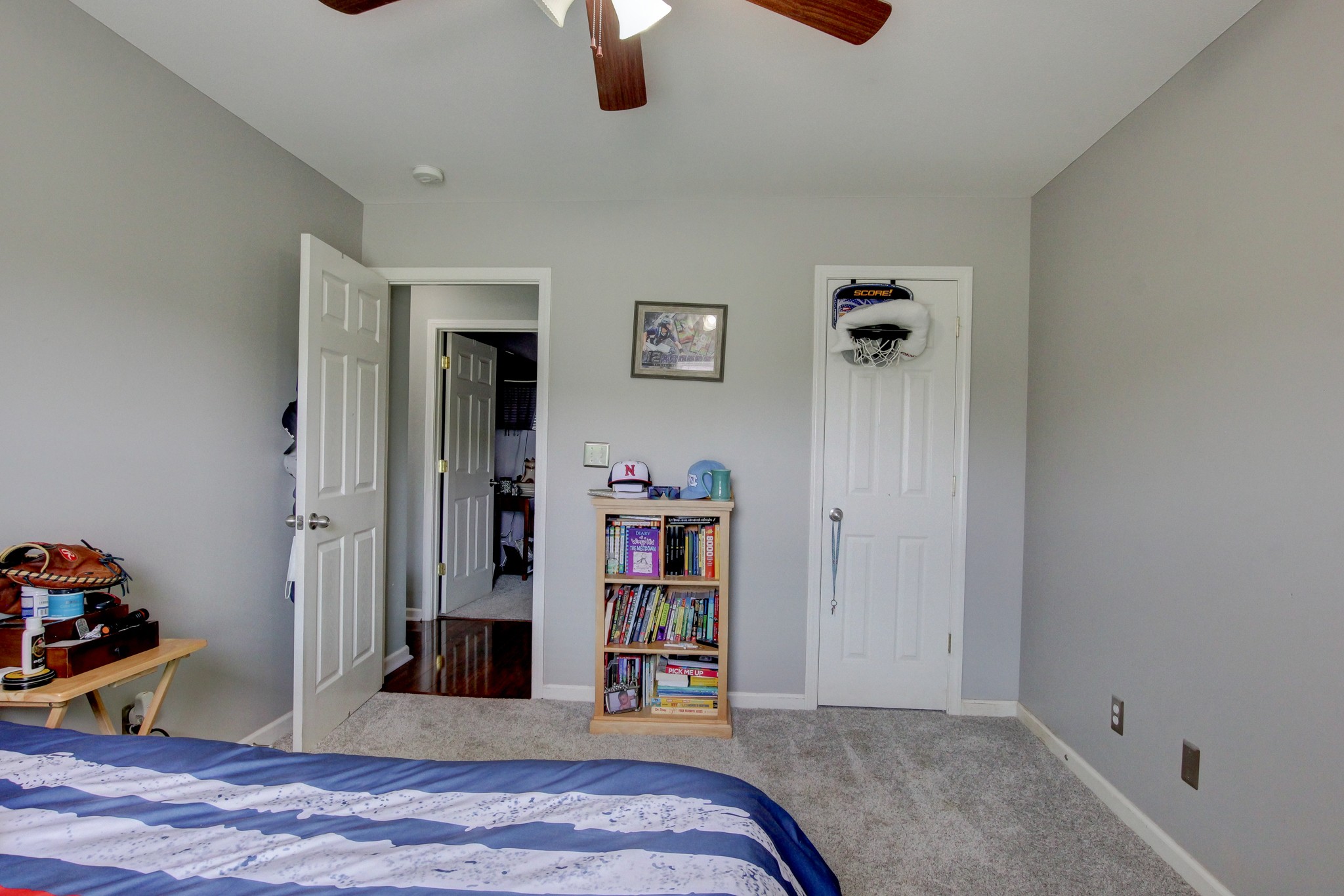 2907 Rome Lane Clarksville, TN 37040 - Photo 13 of 20 a bedroom with bed and a chandelier