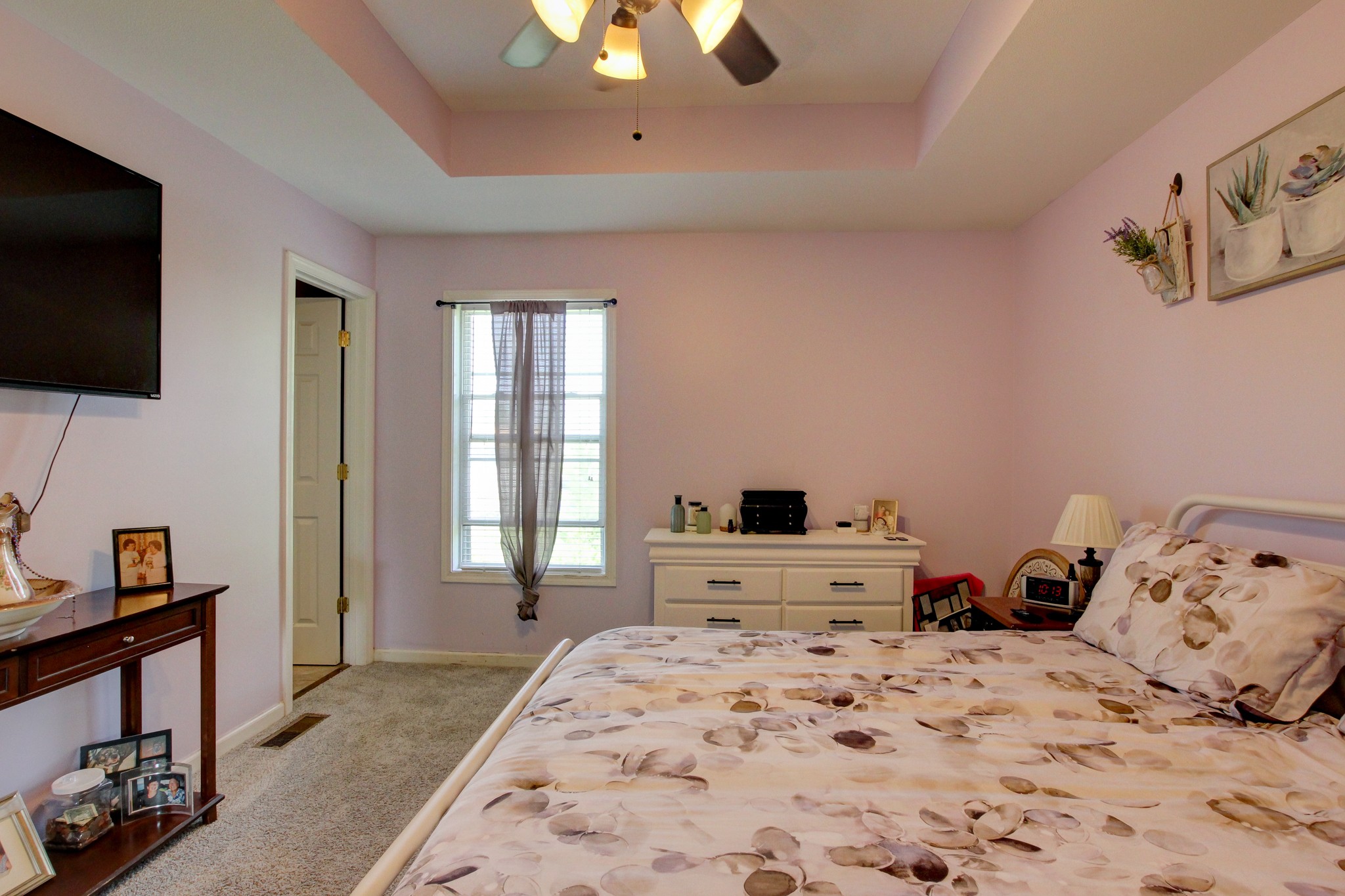 2907 Rome Lane Clarksville, TN 37040 - Photo 15 of 20 a bedroom with a bed and flat tv screen on the dresser