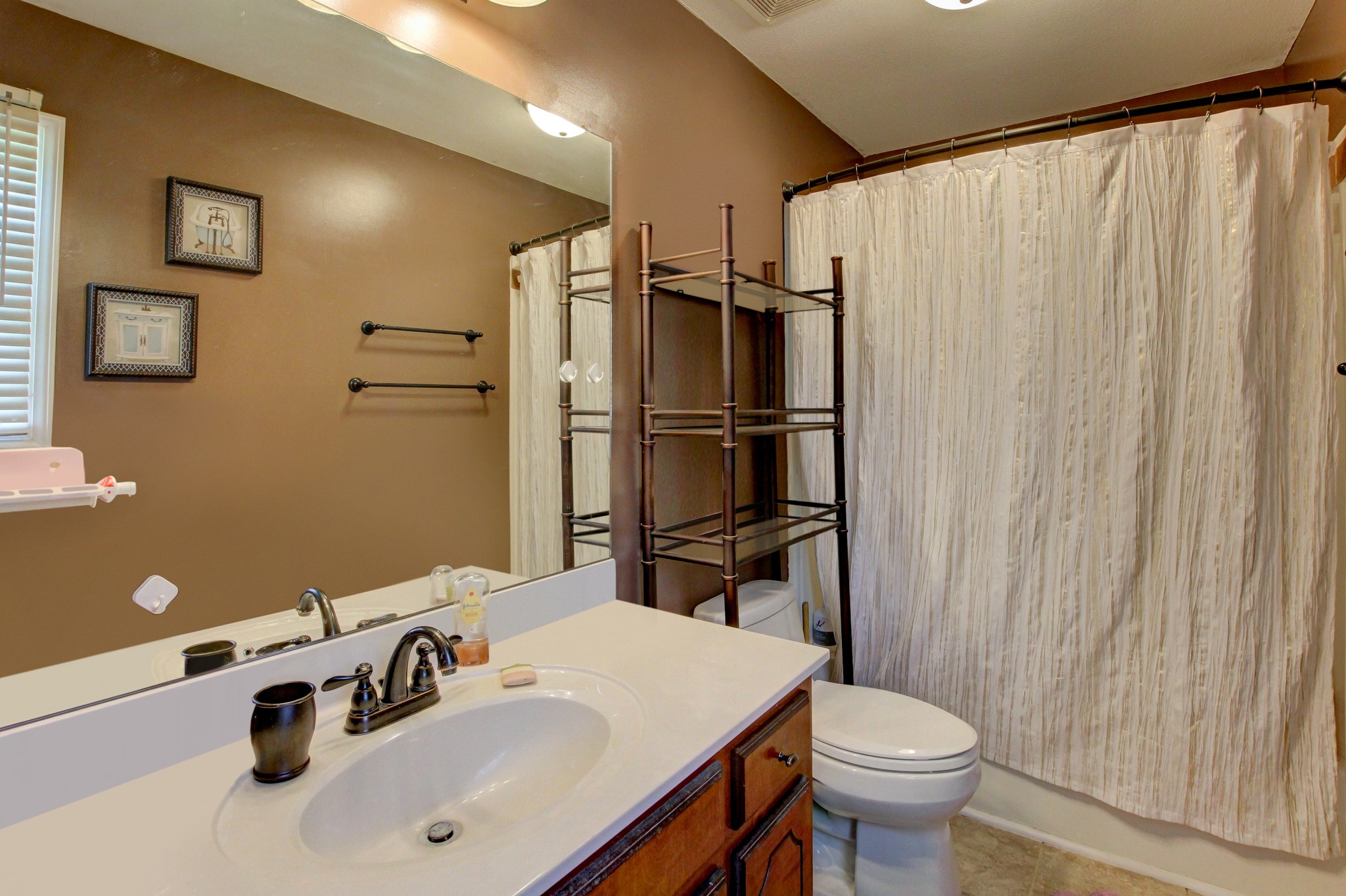 2907 Rome Lane Clarksville, TN 37040 - Photo 17 of 20 a bathroom with a sink toilet and shower