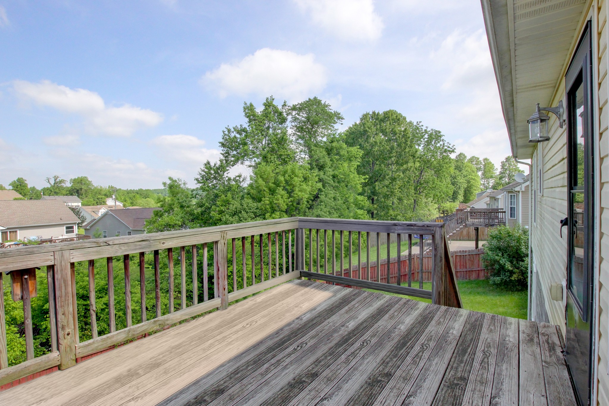 2907 Rome Lane Clarksville, TN 37040 - Photo 8 of 20 a view of balcony with wooden floor and fence