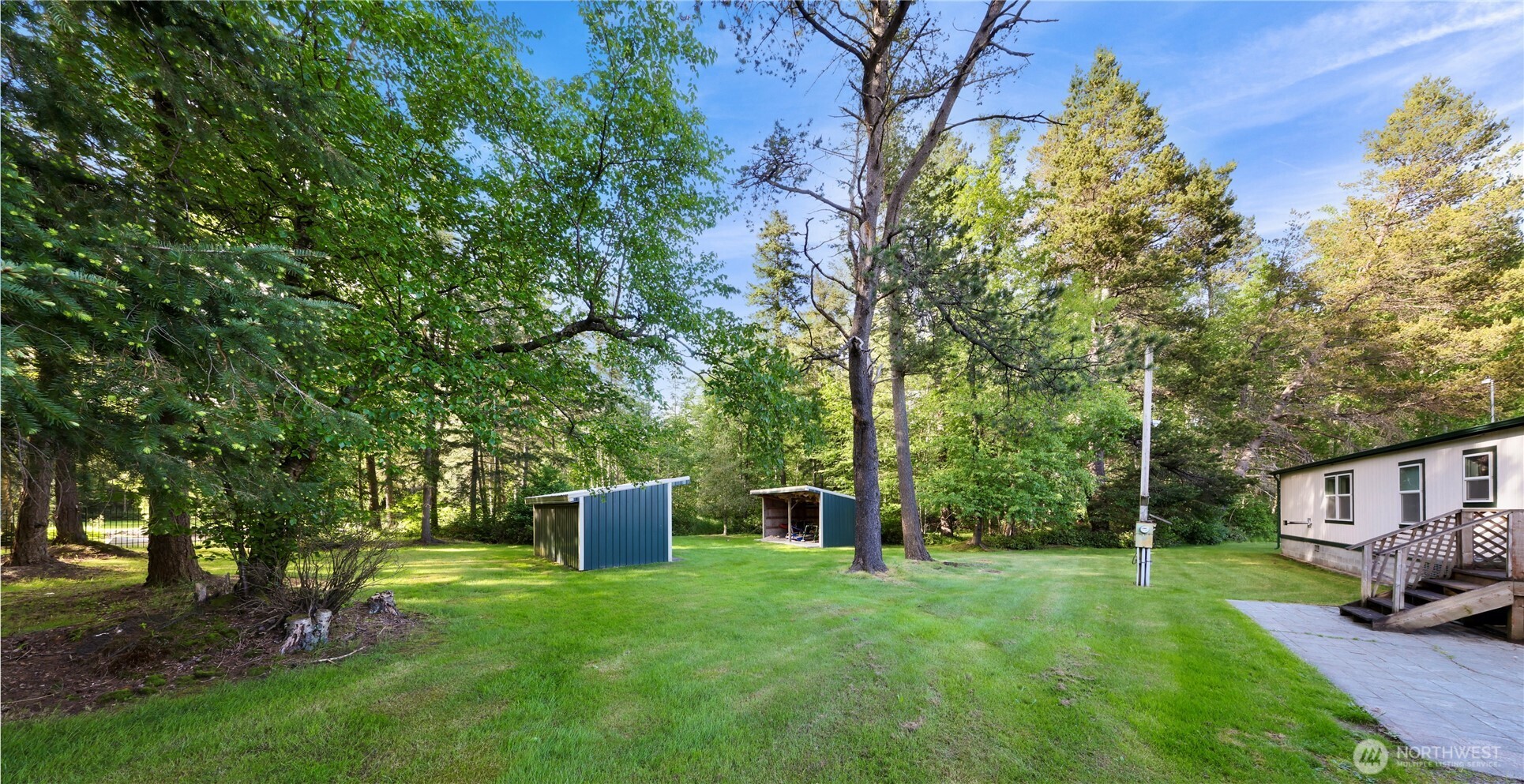 7928 Portal Way Custer, WA 98240 - Photo 32 of 39 a backyard of a house with seating space